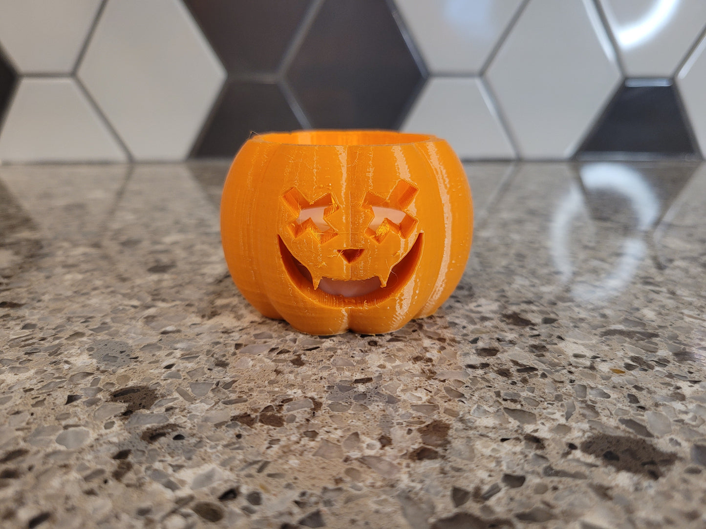 Small pumpkin with tealight
