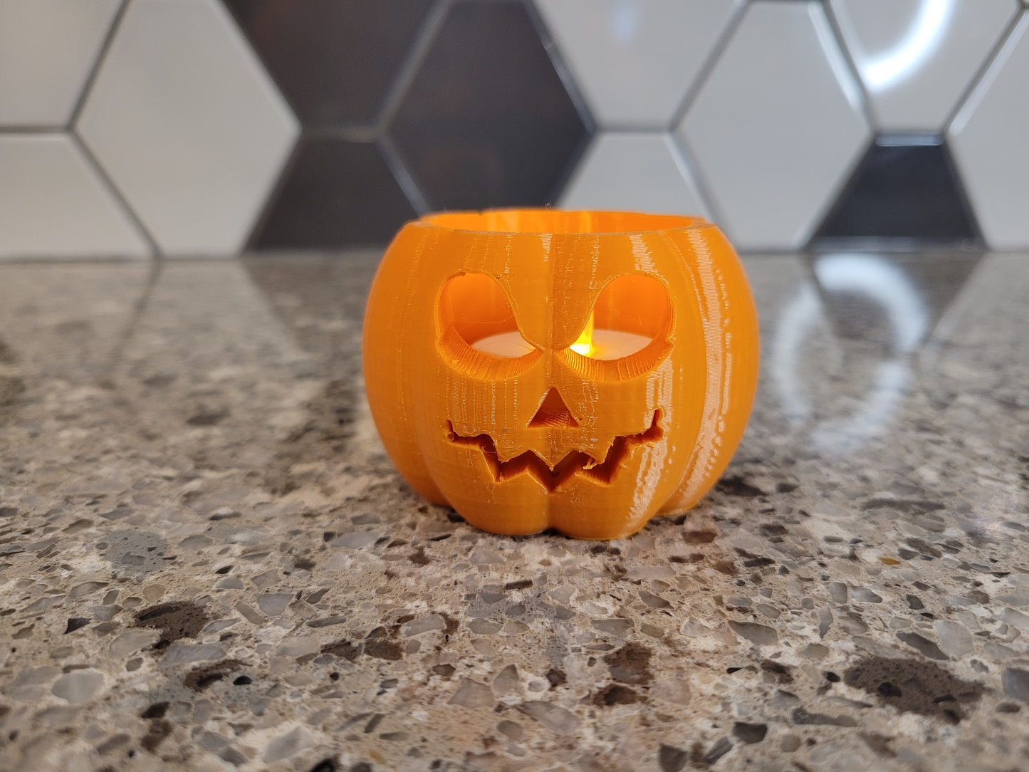 Small pumpkin with tealight